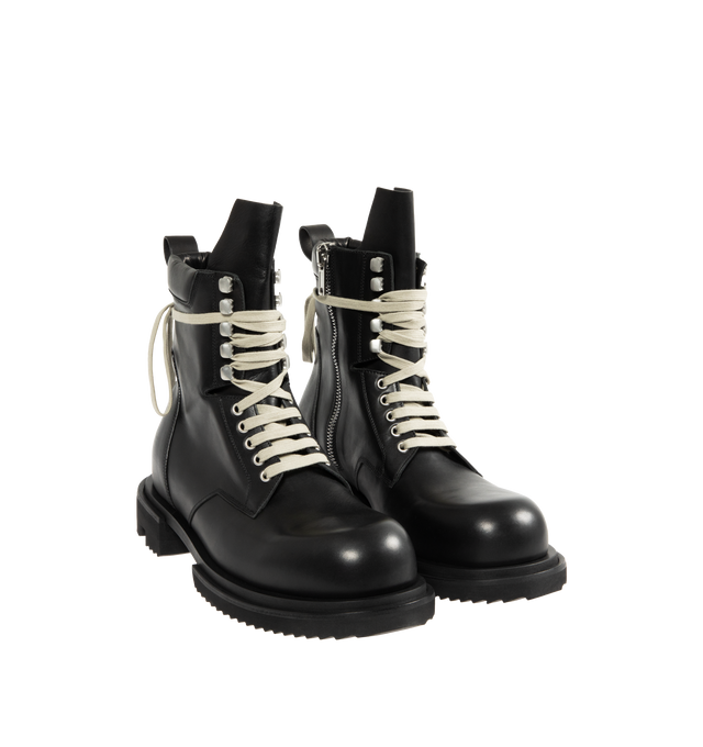 Image 2 of 4 - BLACK - RICK OWENS Low Army Gabe Boot featuring above-ankle height, front laces with eyelets on the foot and lacelets at the ankle, high geometric tongue, a stitched heel counter, long back pull tab, classic army sole and a low heel. 100% calf leather. 