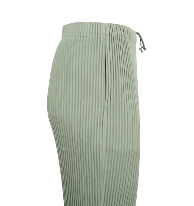 Image 3 of 3 - GREEN - ISSEY MIYAKE Pleated Pants featuring allover pleating, elasticized waist, side slip pockets, cropped fit, straight legs and pull on style. Polyester. Made in Japan. 