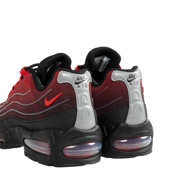 Image 3 of 5 - RED - Nike Men's Air Max 95 Big Bubble Sneaker featuring textile and synthetic leather, visible Max Air cushioning, flex grooves in the midsole and outsole, foam midsole and rubber outsole. 