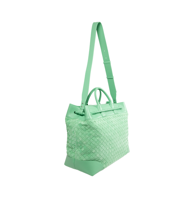 Image 2 of 3 - GREEN - BOTTEGA VENETA Andiamo Voyager featuring suede and smooth leather with signature knot detail, adjustable and detachable cross-body strap, two top handles, one interior zipped pocket, two flat open pockets, one key hook on a strap and magnet closure. Lining: canvas. 15.4" x 16.9" x 7.1". Calfskin. Made in Italy. 