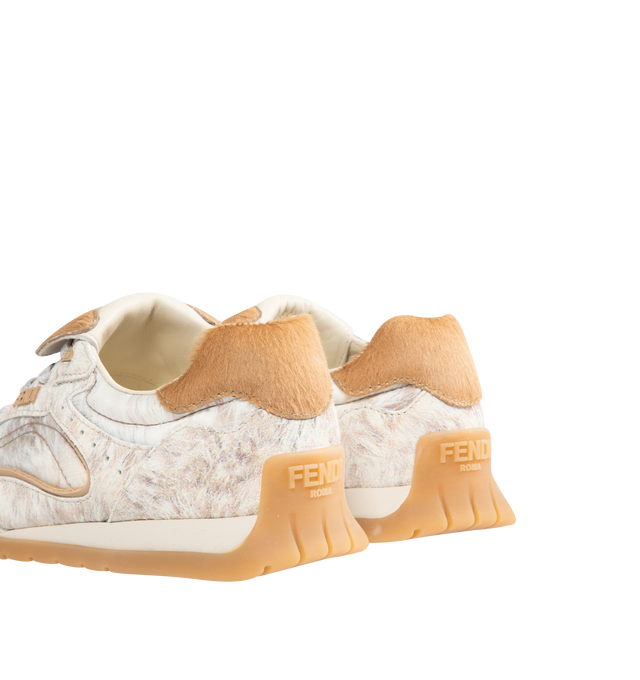 Image 3 of 5 - NEUTRAL - FENDI Wave Pulse Sneaker featuring low-tops, lace-up, made of technical fabric with a white graphic print an beige suede inserts, cavallino calfskin fold-over tongue and heel counter, three-dimensional rubber logo on the side, gold metal Fendi logo on the tongue, rubber running sole with wraparound edge on the side and diagonal F motif. 100% calfskin, 100% polyamide, inside: 100% lamb leather. Made in Italy. 