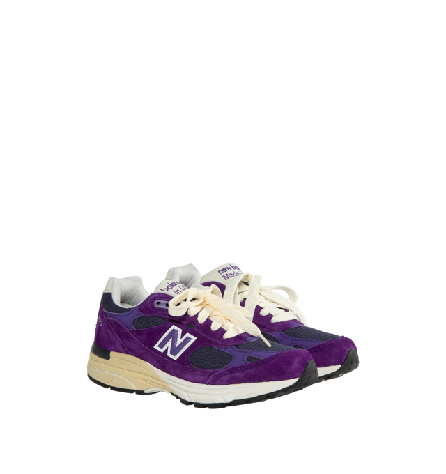 Image 2 of 5 - PURPLE - New Balance Made in USA 993 Sneaker 993 in a streamlined design with fine-tuned the ABZORB midsole cushioning, mesh upper, overlaid with premium nubuck, outfitted in a vivid interstellar purple, atop a dual color white and off-white midsole with reflective accents.  ABZORB midsole absorbs impact through a combination of cushioning and compression resistance.  ACTEVA cushioning delivers versatile, flexible support. Full-length rubber outsole with Ndurance rubber heel for added durabil 