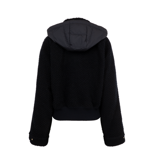 Image 2 of 4 - NAVY - MONCLER Juvigny Hooded Tweed Bomber Jacket featuring piped trims and gold-tone hardware, detachable, adjustable hood, point collar with throat latch, long raglan sleeves with snap cuffs, signature leather logo patch at left sleeve, slip pockets, classic fit, rib-knit hem and two-way zip-front. Virgin wool, polyester, leather. Fill: Down/feather. 
