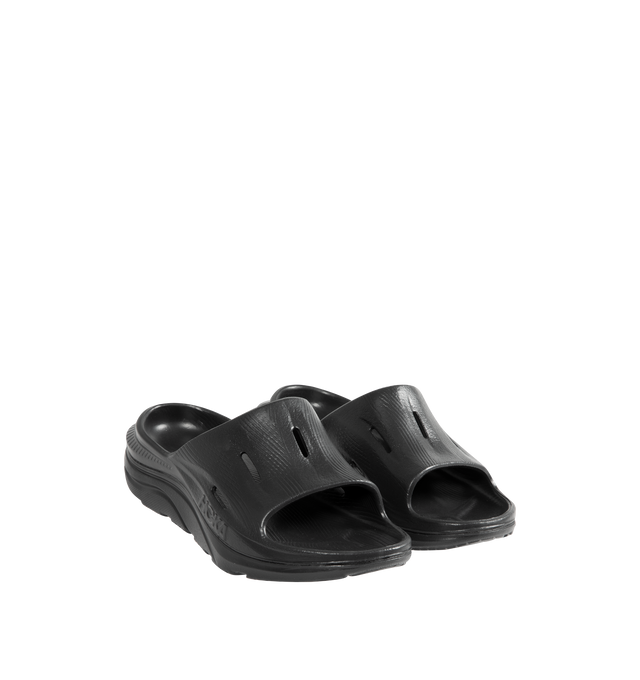 Image 2 of 4 - BLACK - HOKA Ora Recovery Slide 3 featuring perforated rubber upper with EVA sole, slip-on styling and molded footbed.  