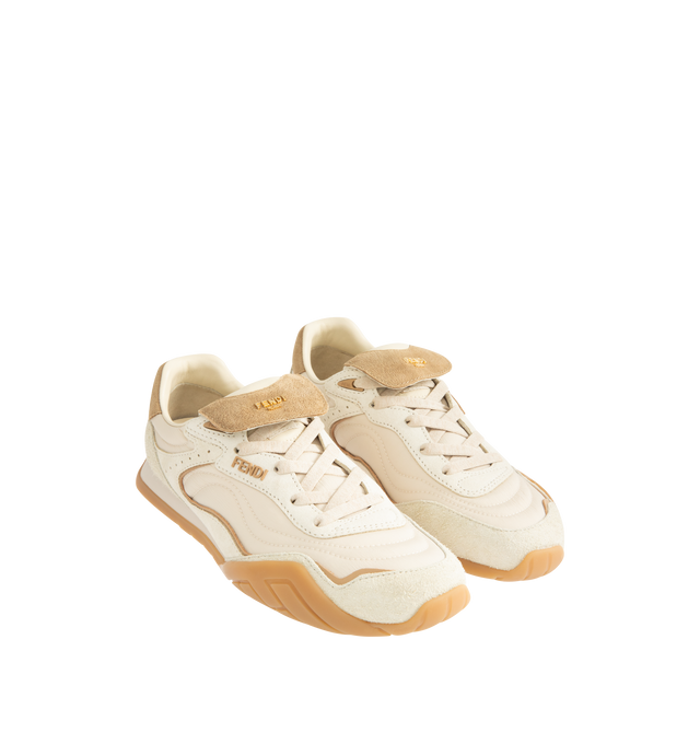 Image 2 of 5 - WHITE - FENDI Wave Pulse Sneaker featuring low-top, lace-up, suede, technical fabric and printed details, contrasting cavallino calfskin inserts and folded tongue, mlange tubular laces, three-dimensional rubber logo on the side, gold-colored metal Fendi logo on the tongue, rubber running sole with wraparound edge on the side and diagonal F motif. 100% calfskin. Inside: 100% lambskin. Made in Italy. 