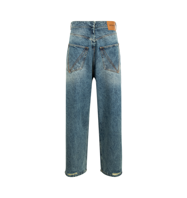 Image 2 of 3 - BLUE - VETEMENTS Back To Front Wide-Leg Denim Jeans featuring concealed hook-and-eye and zip-fly fastening at front, exposed button fastening at back, relaxed fit, high-rise, wide leg, belt loops, two patch pockets and brand patch at front, two slip pockets at back and faded wash. 100% cotton. Made in Italy. 