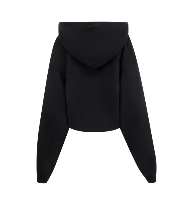 Image 2 of 2 - BLACK - Fear of God Essentials Cropped Fleece Hoodie has a raw edge v-neck, an attached hood, ribbed trims, a cropped length, and graphic screen printing. 100% cotton.  