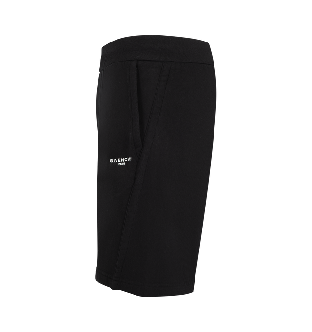 Image 3 of 3 - BLACK - Givenchy Men's Couture Seam Shorts are crafted from soft fleece and feature an elasticated drawstring waistband and signature couture seam construction that creates a rounded silhouette. Designed for elevated everyday comfort, this relaxed Bermuda style is finished with contrasting Givenchy Paris embroidery at the front left leg, a Givenchy Paris Archives label at the back, and multiple pockets for functionality. Main Material: Cotton Fleece. 