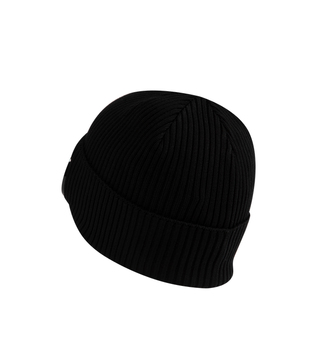 Image 2 of 2 - BLACK - C.P. Company Goggle Beanie features the brand's goggle detail, a ribbed knit design, and a turned-up brim. 100% cotton. Made in Italy. 