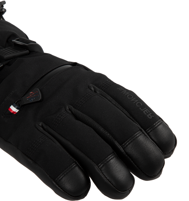 Image 2 of 2 - BLACK - Moncler Grenoble Padded Gloves are made with 4-way stretch nylon, protective leather patches, adjustable drawstrings, and hooks for attaching to a belt or bag. Lining: 65% polyester, 35% cotton. Nappa leather on palms and fingers. Made in Vietnam.  