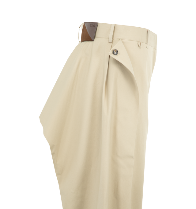 Image 3 of 3 - NEUTRAL - LOEWE Trousers in lightweight fluid wool tailoring featuring loose flaps at the sides and back that can be attached via a front button, regular fit, regular length, mid waist, wide leg, concealed zip fly, seam pockets and double L embroidery placed at the front. Wool. Made in Italy. 