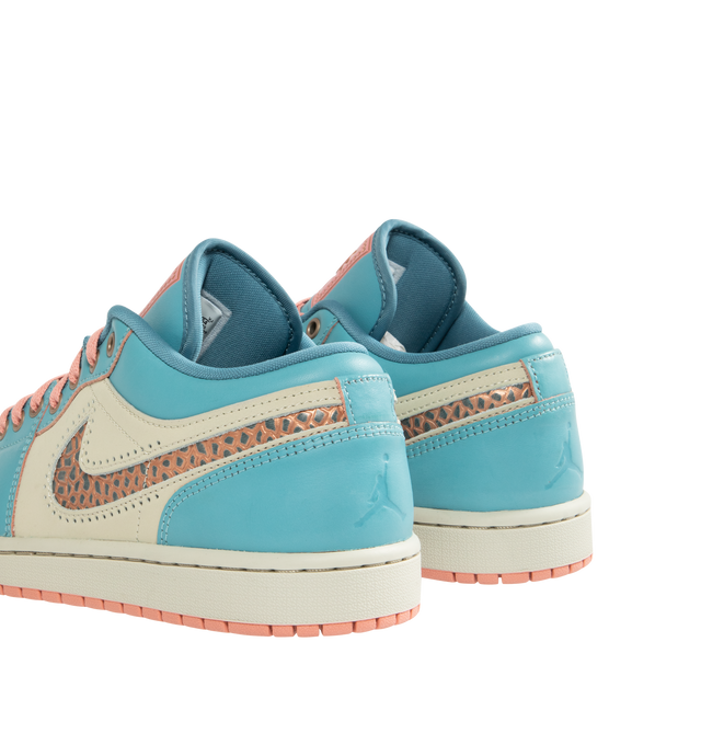 Image 3 of 5 - BLUE - JORDAN Air Jordan 1 Low SE Sneaker featuring genuine leather upper that wears away over time to reveal another colour, encapsulated Air-Sole unit that provides lightweight cushioning and solid rubber outsole. 