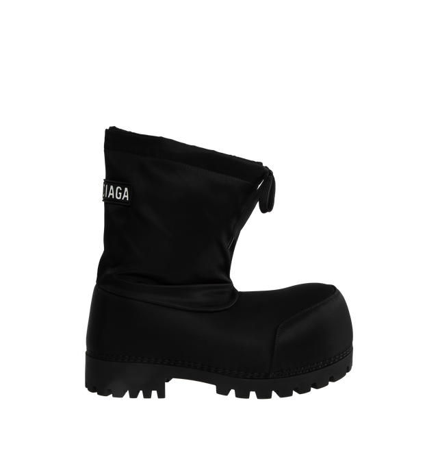 Image 1 of 4 - BLACK - BALENCIAGA Alaska Low Boot featuring nylon, extra round toe, exaggerated proportions, Balenciaga rubber tag at back and drawstring at top. 100% polyamide. Made in Italy. 