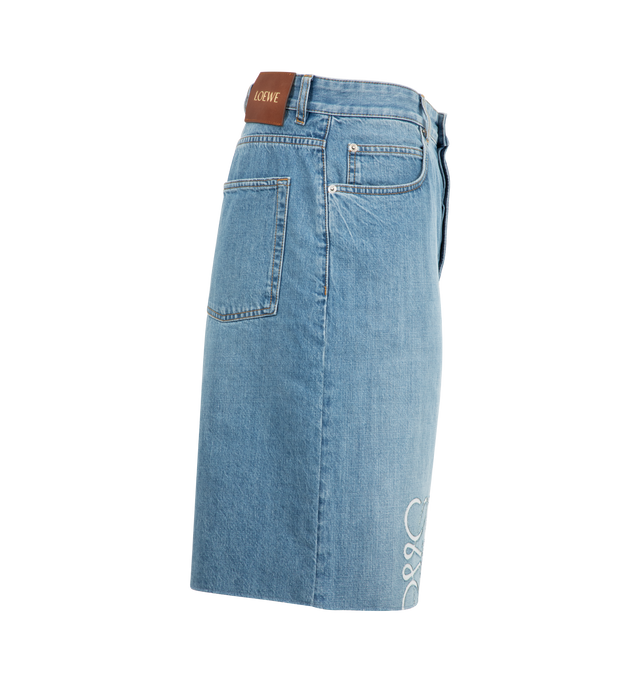 Image 3 of 3 - BLUE - LOEWE Anagram Shorts in denim featuring Anagram cut-outs at the knees, regular fit, regular length, mid waist, concealed button fly, five pocket style, raw hem and LOEWE embossed leather patch placed at the back. Cotton. Made in Italy. 