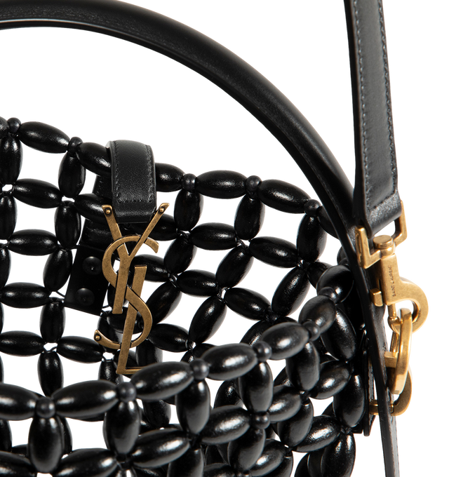 Image 3 of 3 - BLACK - Saint Laurent Womens Le 37 Bucket Bag is crafted from wooden beads. Features an open-work design, top handle, adjustable and removable crossbody strap, YSL strap closure, interior zip pouch, and bronze-tone hardware. Dimensions: 17  20  13 cm. Main Material: Wooden Beads; Hardware: Bronze-Tone Metal. Made in Italy. 