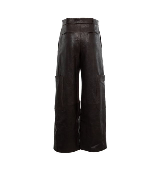 Image 2 of 4 - BROWN - KHAITE Caiton Leather Wide-Leg Cargo Pants featuring cargo pants in lambskin leather with leg patch pockets, mid rise sits high on hip, flat front, angled side slip pockets, back welt pockets, wide legs, full length and hook zip fly and belt loops. Leather. Made in Romania. 