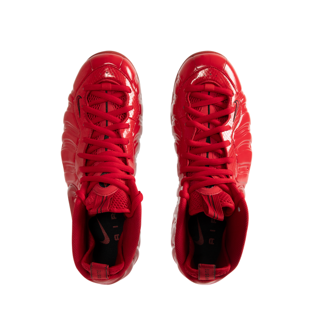 Image 5 of 5 - RED - NIKE Air Foamposite Pro Sneaker featuring Foamposite upper that molds to your foot, full-length and heel Zoom Air cushioning, foam midsole and rubber outsole with herringbone tread. 