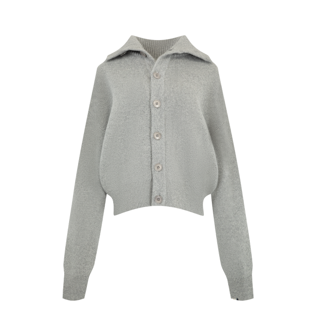 Image 1 of 2 - GREY - Extreme Cashmere Women's N377 Clement Cardigan Sweater is crafted from heavyweight cashmere in a luxurious jacquard knit and features a cropped bomber silhouette with dropped shoulders, a rib-knit high collar, two side pockets, and a seven-button front with natural corozo buttons. This designer cashmere cardigan combines exceptional warmth with contemporary styling, offering a versatile collar that can be worn folded down or as a cozy turtleneck. Main Material: 100% Cashmere. 