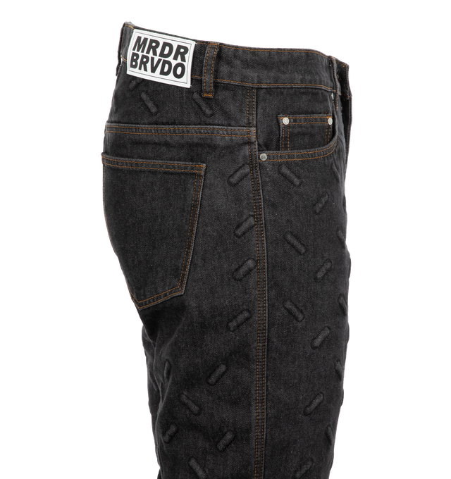 Image 3 of 3 - BLACK - Who Decides War Thread Plate Denim Jeans are comprised of 100% cotton and feature a flared cut. The pants feature an inseam of 35.5 inches and are sewn with an embossed thread plate pattern throughout. 