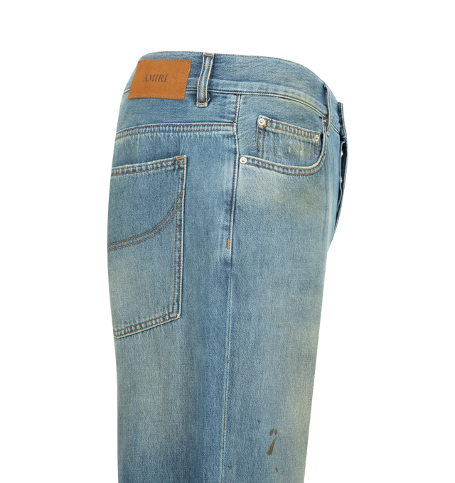 Image 3 of 3 - BLUE - Amiri Mens Slash Bootcut Jeans are crafted from cotton denim. Features a bootcut fit, washed and distressed finish, slashed detailing, classic five-pocket styling, and zip-fly with button closure. Main Material: 100% Cotton. Made in Italy. 