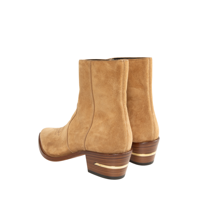 Image 3 of 4 - NEUTRAL - Amiri Men's Suede MA Pointy Boots are crafted from premium suede and feature a sleek pointed-toe silhouette with a streamlined profile for a refined Western-inspired look. These designer ankle boots combine exceptional craftsmanship with Amiri's signature luxury aesthetic, creating a versatile statement style that transitions effortlessly from day to evening. Main Material: Suede. Sole: Leather. 