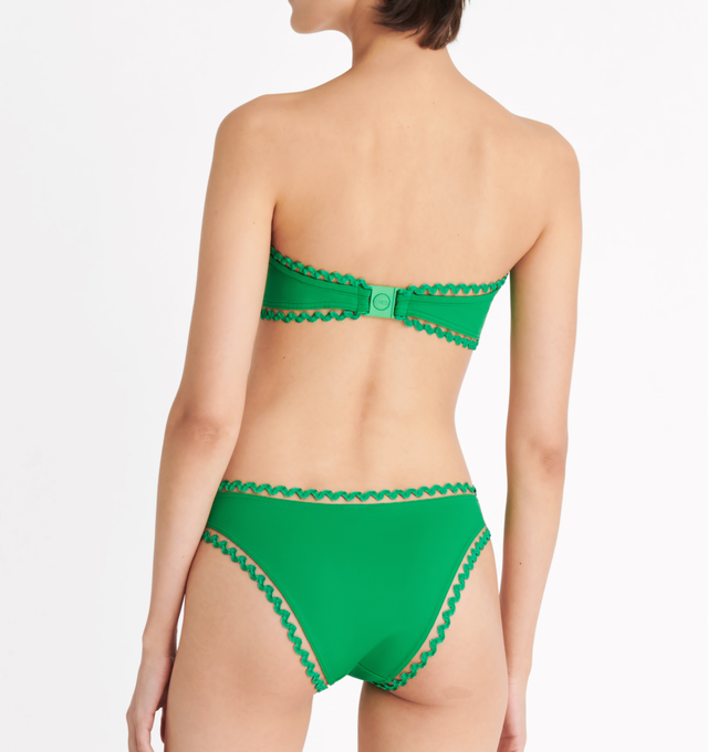 Image 5 of 6 - GREEN - ERES Mix Bandeau Bikini Top featuring bandeau bikini top, rick rack edge suspended by a nylon thread, side shirring, side stays and branded clasp. Main: 84% Polyamid, 16% Spandex. Second: 93% Polyamid, 6% Spandex, 1% Polyester. Made in France.  