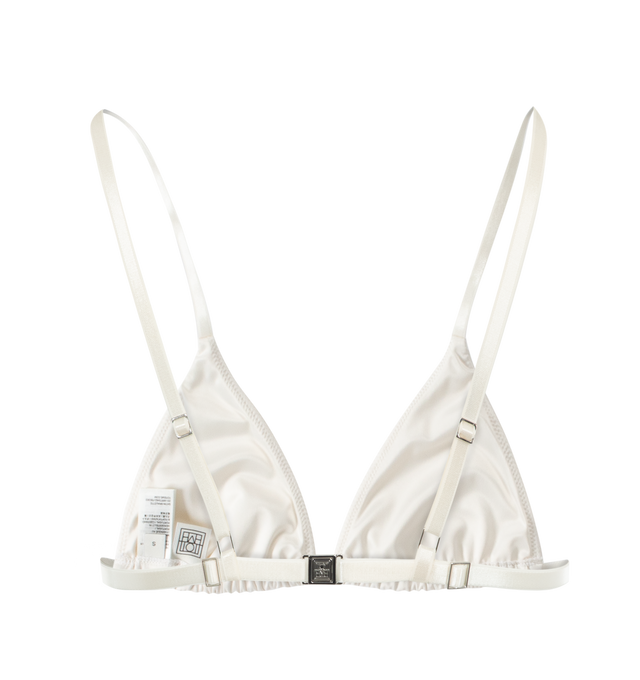 Image 2 of 2 - WHITE - TOTEME bralette to be paired with elegant shirts and blazers. It is made from featherlight and soft satin with a hint of elastane for comfort and has slim straps that can be adjusted for a personalized fit. Elasticated and adjustable straps. Silver-tone metal sliders and clasp. Matching lining. 92% polyester recycled, 8% elastane. 