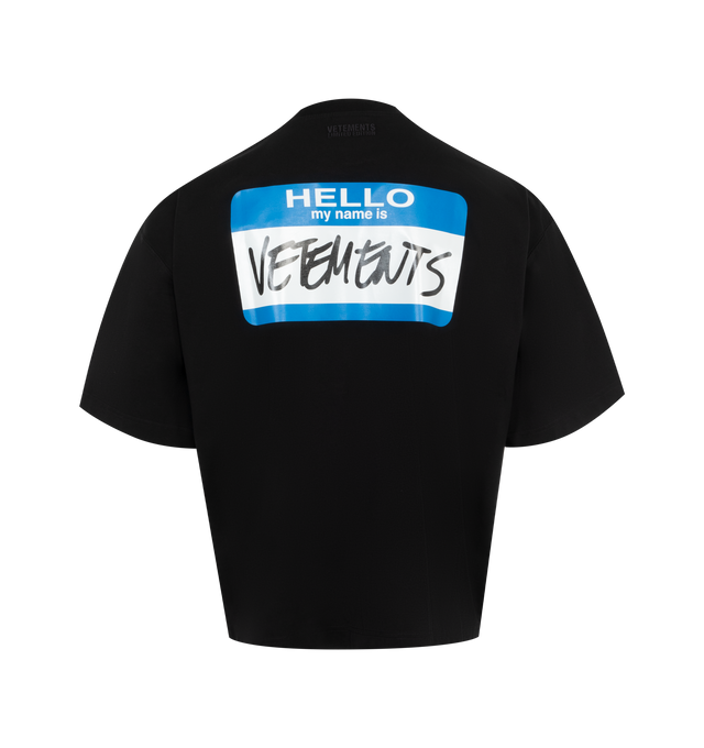 Image 2 of 2 - BLACK - Vetements My Name Sticker Cropped T-Shirt has a crew neck, dropped shoulders, a cropped hem, and a logo printed at the chest and on the back. 100% cotton. Made in Portugal.  