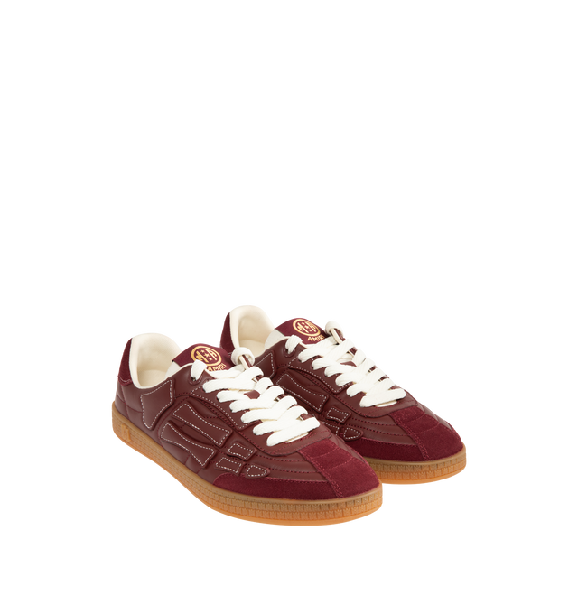 Image 2 of 5 - BROWN - AMIRI Pacific Football Sneaker featuring low-top sneakers, round toe, a combination of leather and suede matte panels on the upper, logo embroidery on the heel tab and tongue, contrast stitching and a rubber sole.  