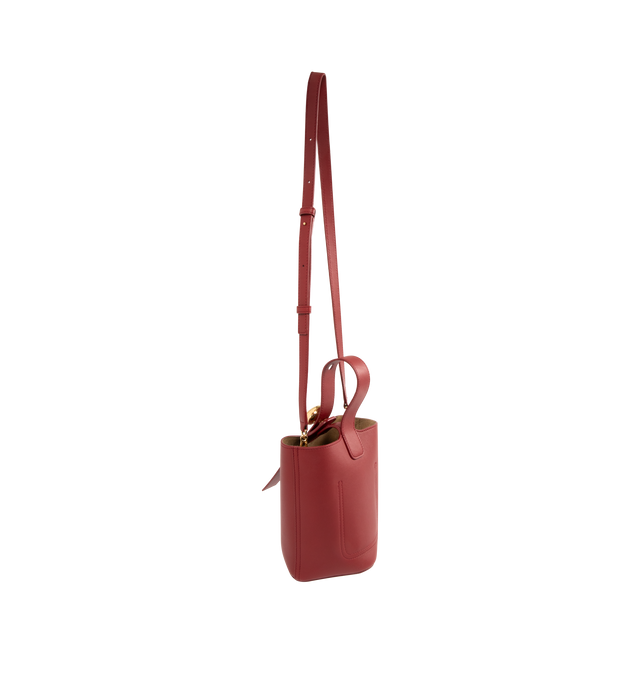 Image 2 of 3 - RED - LOEWE Mini Pebble Bucket Bag featuring magnetic closure, internal pocket, bonded suede lining, anagram engraved Pebble, crossbody, shoulder or hand carry and adjustable and removable strap. 7.7 x 6.3 x 6.3 inches. Mellow Calf. Made in Spain.  