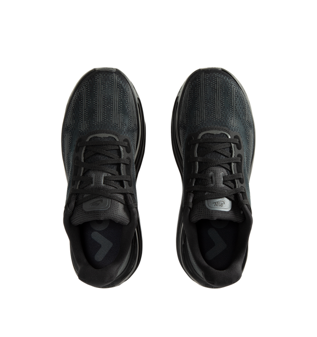 Image 5 of 5 - BLACK - Nike Vomero Premium SP "Skeleton" Sneakers feature Nike's most advanced everyday running platform, combining dual Air Zoom units with ultra-responsive ZoomX foam for exceptional cushioning and energy return. This special-edition "Skeleton" design is distinguished by reflective skeletal graphics that enhance visibility while delivering a bold, Halloween-inspired aesthetic. Engineered for comfort on daily runs and all-day wear, the silhouette balances maximum cushioning with a sleek 