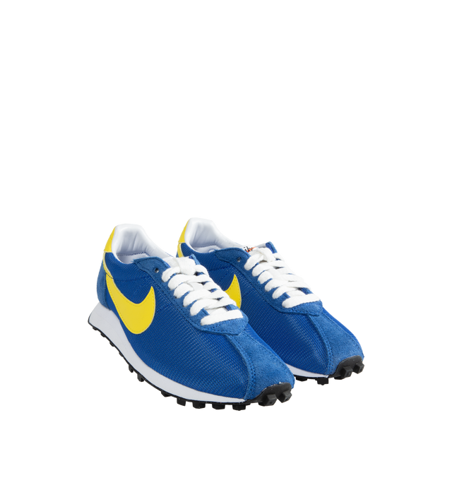 Image 2 of 5 - BLUE - Nike LD-1000 retro running shoe reissued with its iconic flared heel. This edition of the heritage classic returns in nostalgic Game Royal and Opti Yellow hues. Real and synthetic leather merge with airy textiles and the iconic Waffle sole. 