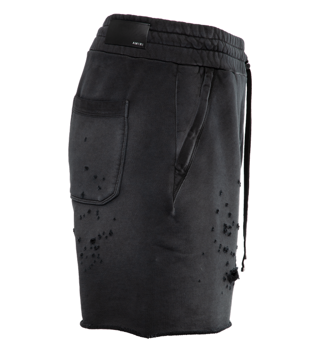 BLACK - AMIRI MA Logo Shotgun Sweatshort featuring distressed style, elasticated waist with metal tip drawstrings, logo print, and pockets. 100% cotton. Made in Italy.