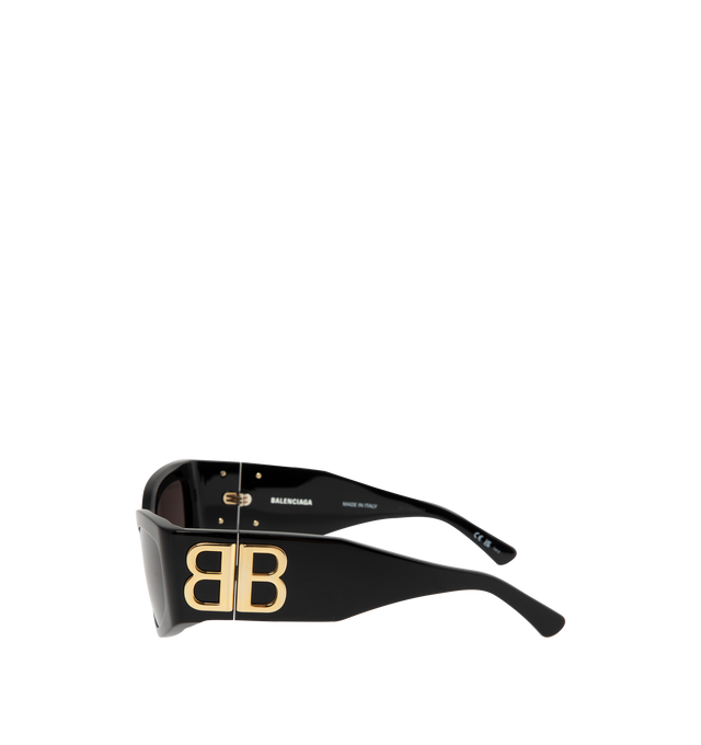 Image 2 of 3 - BLACK - Balenciaga Bossy Cat Sunglasses are designed with acetate alternative frames, gray lenses, hidden hinges with gold logos, and a lasered logo on the right lens. 100% UV/UVB protection. Made in Italy.  