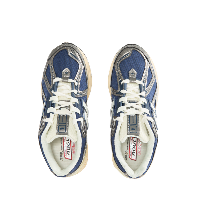 Image 5 of 5 - BLUE - NEW BALANCE 1906R Sneaker featuring ACTEVA LITE midsole cushioning, ABZORB SBS heel cushioning, N-ergy outsole provides superior shock absorption, Stability Web outsole technology provides added arch support, TPU heel cage and rubber outsole. Mesh upper with synthetic overlays. Unisex style in men's sizes. 