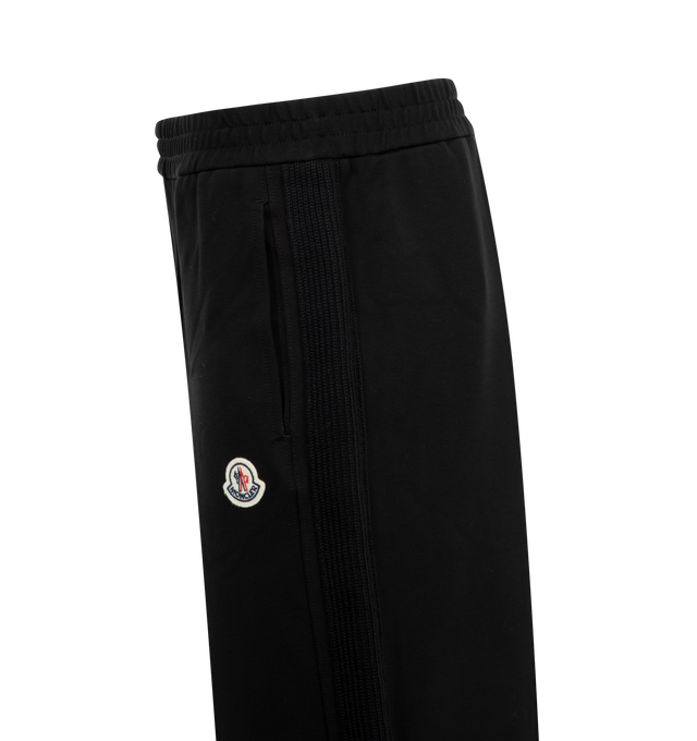 Image 3 of 3 - BLACK - Moncler Elastic Waist Sweat Bottoms have an elastic wasitband, knit bands along the legs, and side pockets. 100% virgin wool. 