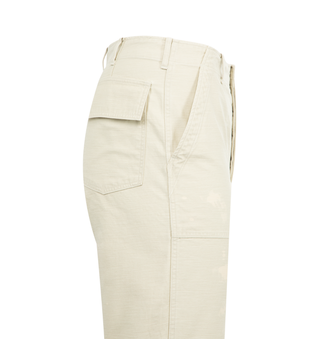 Image 3 of 3 - WHITE - AURALEE Washed Baggy Satin Bleached Baker Pants featuring four pocket style, relaxed fit, button zip closure, belt loops and paint throughout. 100% cotton. 