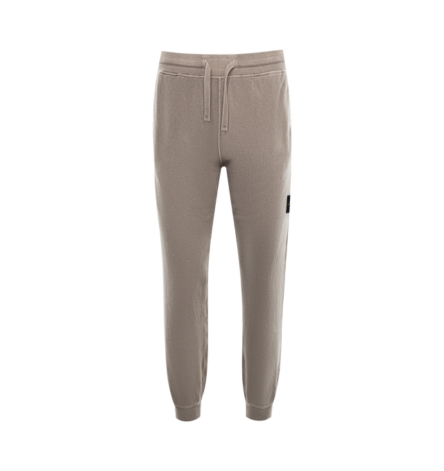 Image 1 of 3 - GREY - STONE ISLAND Fleece Sweatpants featuring elasticized drawstring waistband, side-seam pockets, side zip pocket, back zip welt pocket and rib-knit cuffs. 100% cotton. 