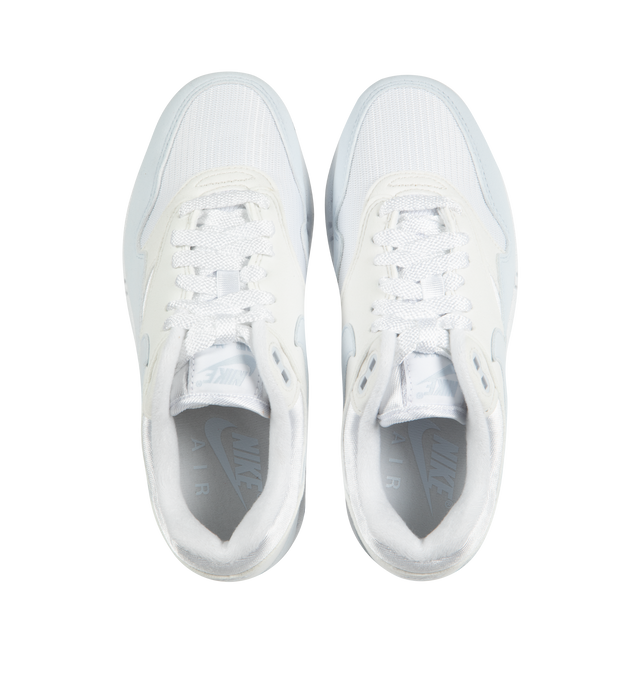 Image 5 of 5 - WHITE - NIKE AIR MAX 1 features a padded, low-cut collar, wavy mudguard, pill-shaped  Nike Air window and rubber outsole gives you durable traction. 