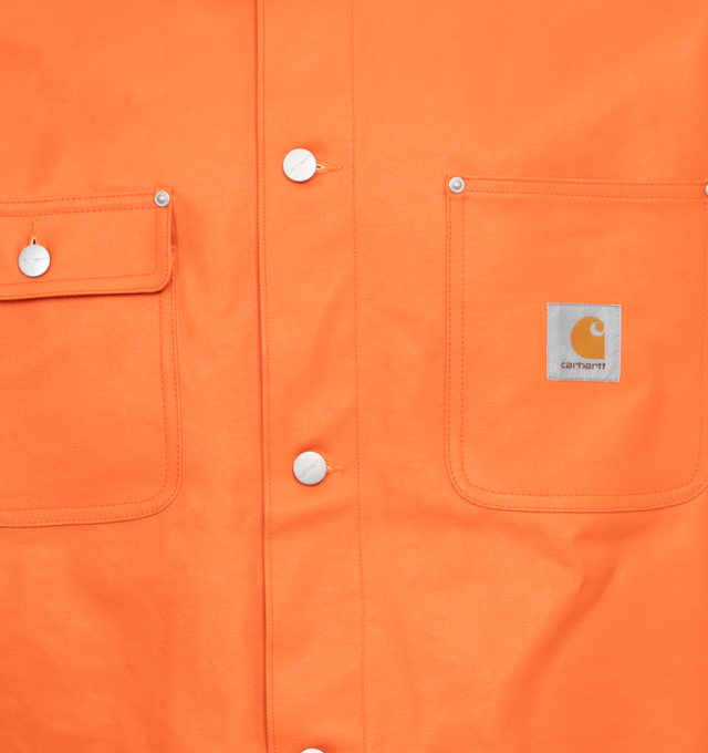 Image 3 of 3 - ORANGE - JUNYA WATANABE X CARHARTT Logo Patch Buttoned Jacket featuring button closure, pockets, corduroy collar and long sleeves. 100% polyurethane. Made in Japan. 