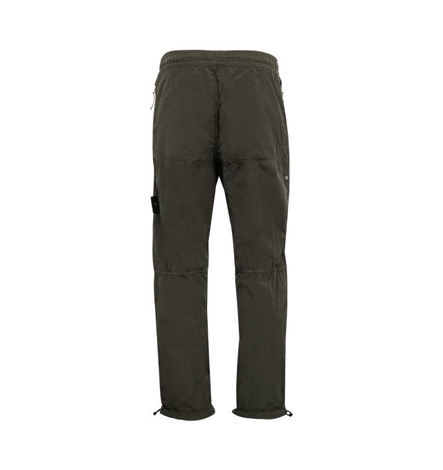 Image 2 of 3 - GREEN - Stone Island Pull-On Pants have an elastic waist, side zip pockets, a signature snap-on logo patch, drawing ankles, and side cargo pockets.  