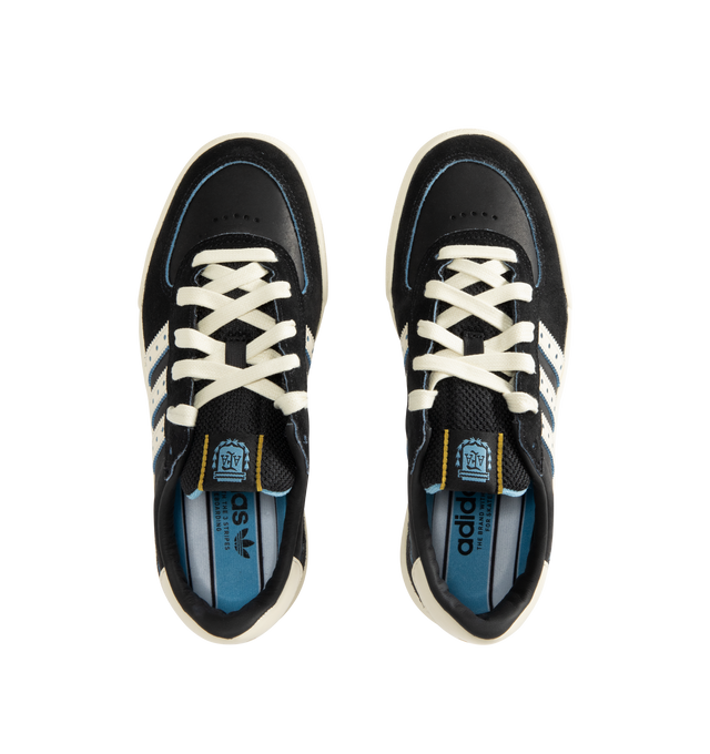 Image 5 of 5 - BLACK - Adidas Mens Glenburn x Thrasher Sneaker is crafted from suede and leather with a rubber sole. Features a lace-up closure, padded tongue with logo patch detail, padded low-cut collar, signature stripes with perforated trim, almond toe, and includes spare laces. Suede and leather upper with rubber sole. Made in Vietnam. 
