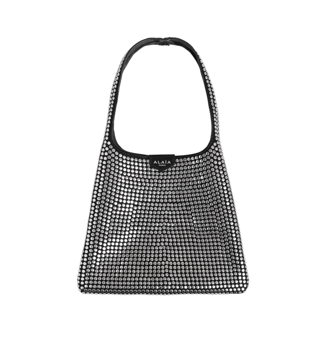 Image 1 of 1 - BLACK - Alaia Small Hobo Studs Bag features sequin-embellished calf leather exterior with calf leather lining. The compact shoulder bag features a sleek hobo silhouette, an interior magnetic top closure, and a short shoulder strap with a 4-inch drop for effortless carry. Dimensions: 8.3" W x 6.9" H x 0.4" D. This slim bag is ideal for essentials such as a phone, card holder, keys, and a few small personal items. Made in Italy. 
