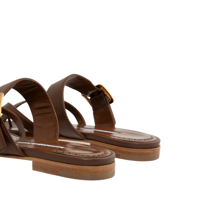 Image 3 of 4 - BROWN - Manolo Blahnik Thalusa nappa leather flat sandals featuring an open toe, crossover front straps with toe stem, instep strap with gold buckle design detail and flat stacked 10mm heel. Upper: 100% lamb nappa. Sole: 100% calf leather. Lining: 100% kid leather. Made in Italy. 