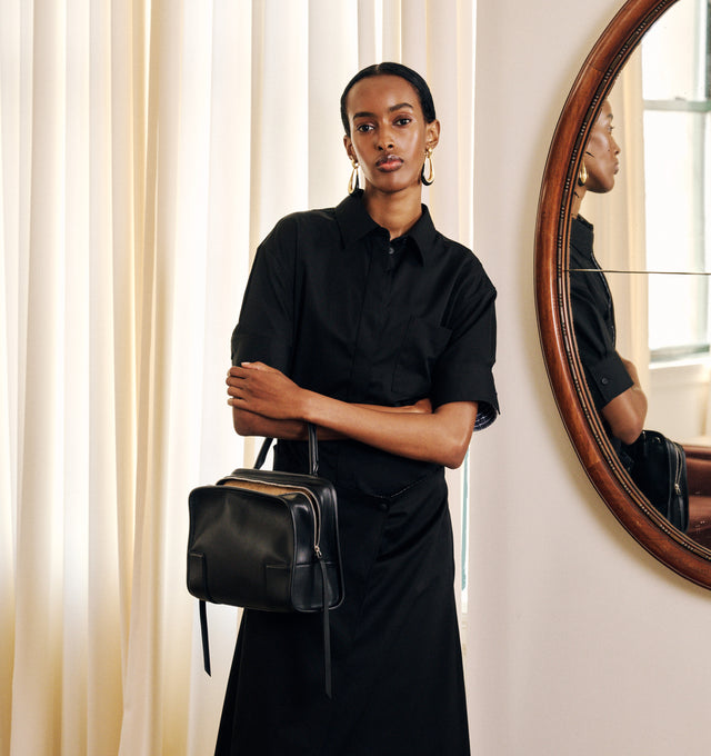 Image 5 of 5 - BLACK - Loewe Amazona Medium 180 Bag in soft calfskin leather featuring a relaxed silhouette with a single toron top handle, designed to be carried open, while a concealed closure secures the main compartment, removable shoulder and crossbody straps, zip closure with two leather zip pullers, two compartments, main compartment closed with magnetic closure, internal flat pocket, suede lining and embossed logo. Soft calfskin. Strap length 108 cm; Strap Drop 50 cm; Handle drop 11 - 28 cm; Height  