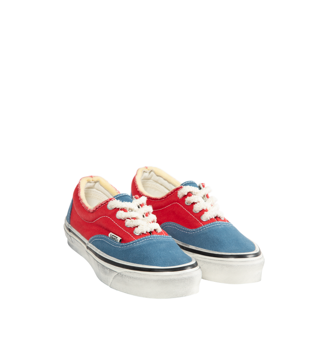 Image 2 of 5 - RED - Vans Unisex OTW Era 95 DST Sneakers are crafted from heavy enzyme-washed canvas and feature the brand's iconic low-top silhouette with a worn-in aesthetic inspired by a well-loved favorite pair. Main Material: Enzyme-Washed Canvas. Closure: Lace-Up. Insole: Sola Foam ADC (All-Day Comfort) Cushioning. Outsole: Signature Rubber. 