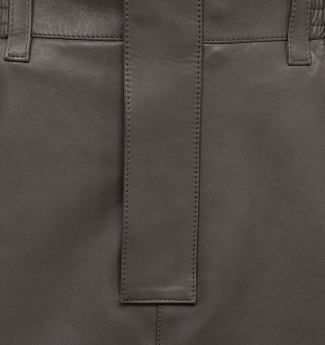 Image 3 of 3 - GREY - SAINT LAURENT Pencil Skirt featuring high waist, back cargo pockets, silk lining, concealed front button closure with zip fly, two slash pockets and waistband with belt loops. 100% lambskin.   