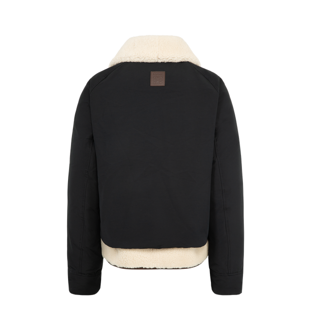 Image 2 of 5 - BLACK - LOEWE Puffer in shearling and cotton blend featuring a detachable shearling vest and collar, regular fit, short length, leather chin strap, snap button and concealed zip front fastening, buttoned gusset flap pockets and LOEWE Anagram embossed leather patch placed at the back. Cotton, polyamide. Made in Italy. 