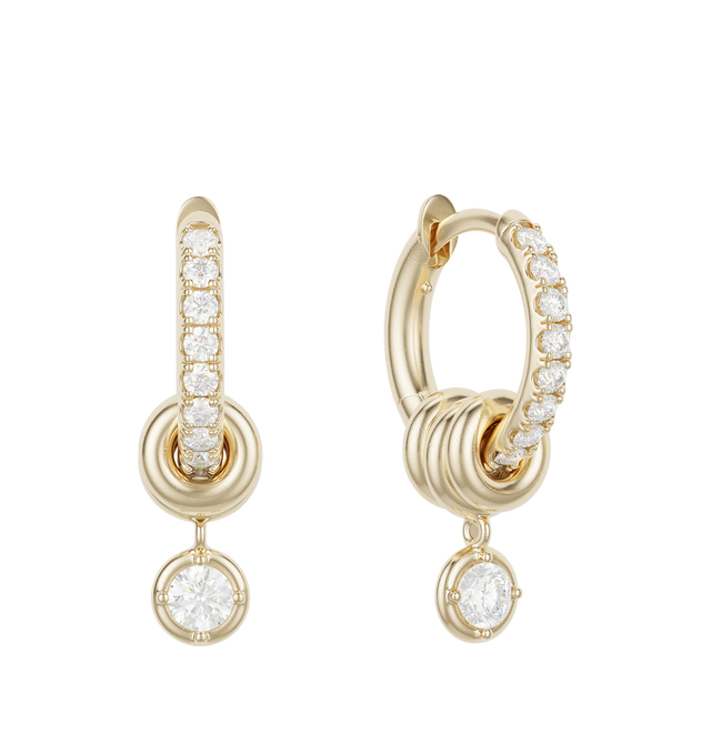 Image 2 of 2 - GOLD - Spinelli Kilcollin Zahra Pav Hoop Earrings display a familiar, streamlined silhouette and comfort closure in 18k gold with pav-set stones. Three annulets adorn each hoop, the center of which bears a drop charm for added contrast and movement. Each Zahra Pav Hoop Earring is individually handmade in Los Angeles. Hoops: 18k yellow gold, 2mm gauge, 9mm internal diameter. Stones: White Diamonds (approx. 0.39 cttw). Annulets: 18k yellow gold. Sold as a pair.Hirshleifers offers a range of pie 