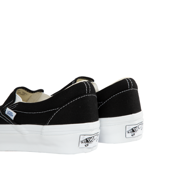 Image 3 of 5 - BLACK - VANS U Slip-On Reissue 98 Sneaker featuring padded collar and stretch gore for added comfort, round toe, slip on, lower collar around the ankle and higher collar above the heel. Canvas upper and lining, rubber sole. 